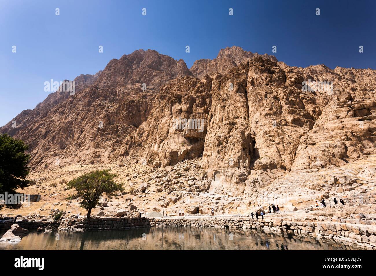 Bisotun(Behistun,Bistun), relief carvings on the face of steep rock cliff,  Kermanshah Province, Iran, Persia, Western Asia, Asia Stock Photo