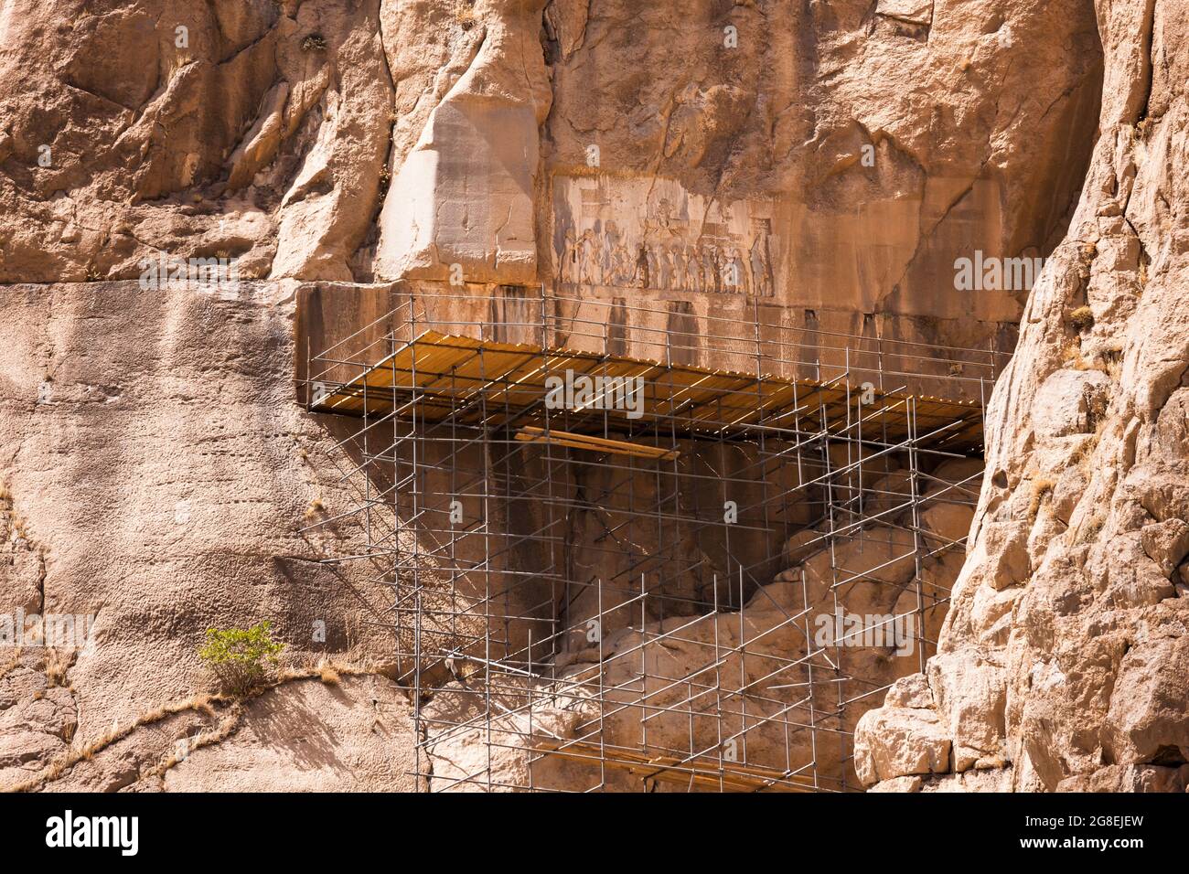 Bisotun(Behistun,Bistun), relief carvings on the face of steep rock cliff,  Kermanshah Province, Iran, Persia, Western Asia, Asia Stock Photo