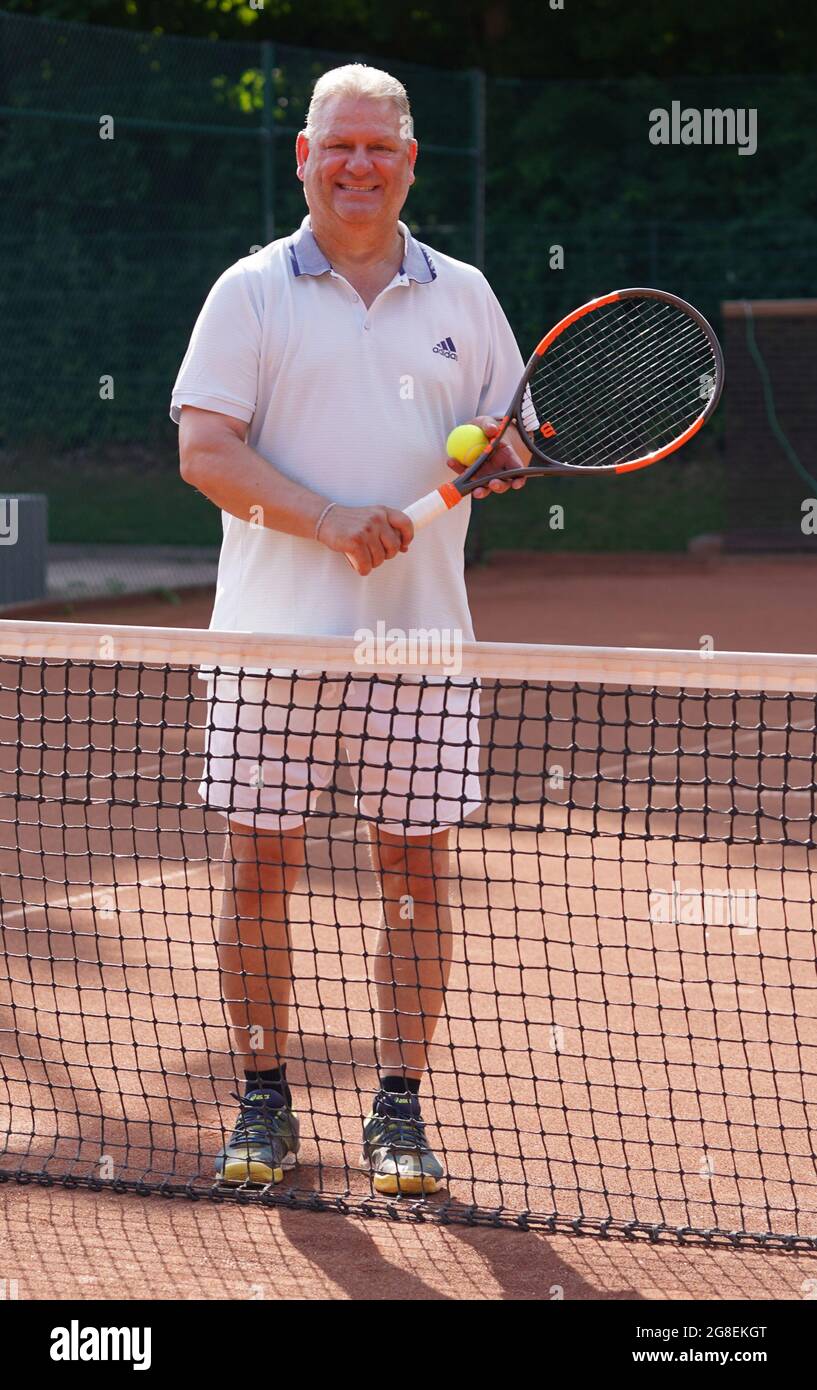 Hamburg, Germany. 15th July, 2021. Frank Pagelsdorf, former coach of  Hamburger SV and Hansa Rostock, stands on the tennis court of SC Condor.  Credit: Marcus Brandt/dpa - IMPORTANT NOTE: In accordance with