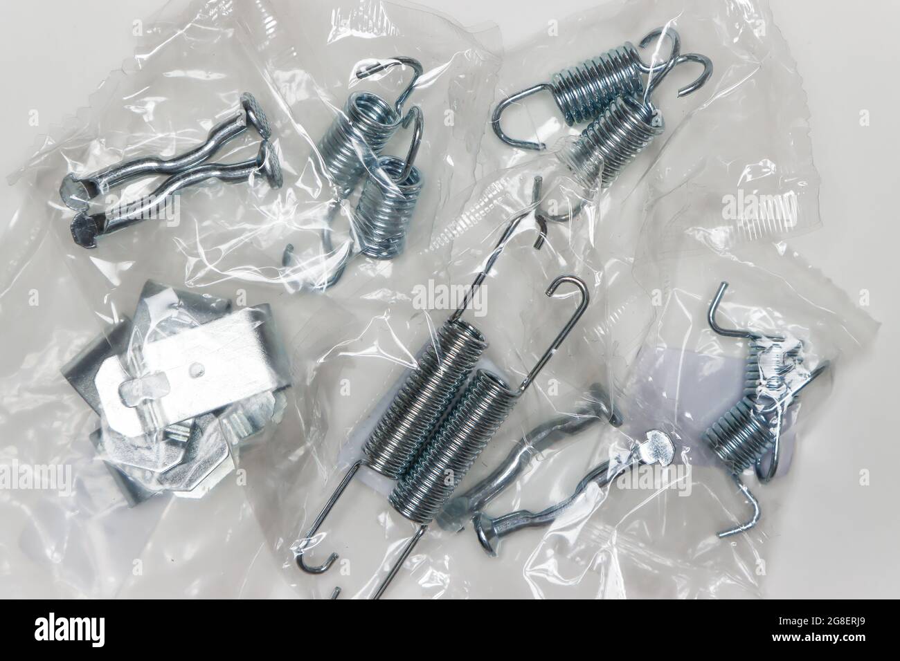 Repair kit for brakes, metal clamps, pins and springs of various