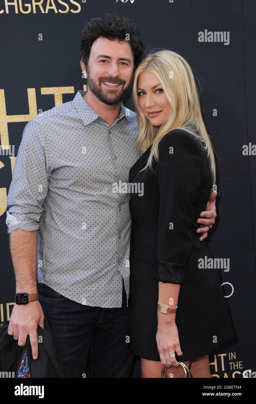 Los Angeles, CA. 19th July, 2021. Beau Clark, Stassi Schroeder at arrivals  for MIDNIGHT IN THE SWITCHGRASS Premiere, Regal LA Live, Los Angeles, CA  July 19, 2021. Credit: Elizabeth Goodenough/Everett Collection/Alamy Live, image size:880x1390