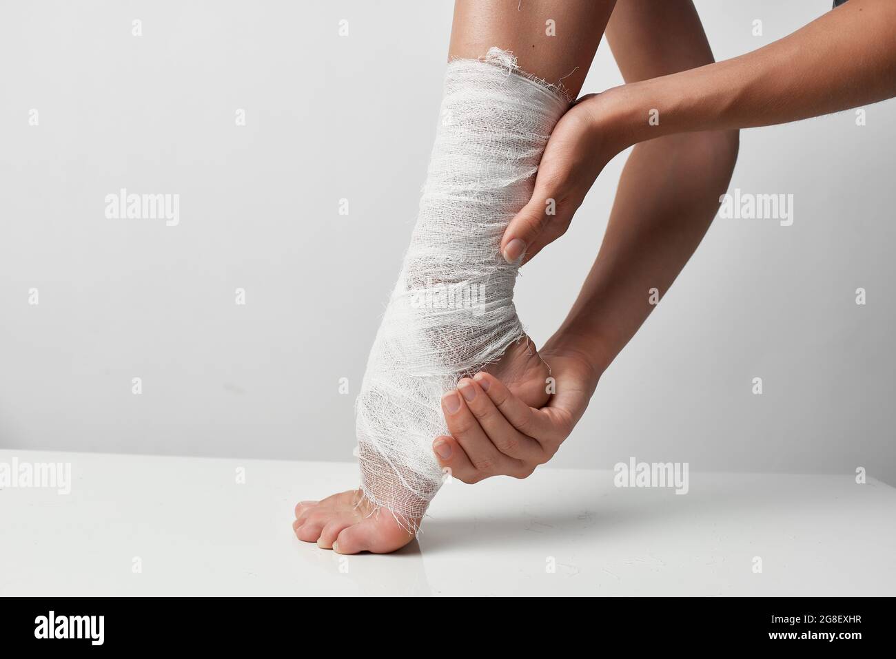 bandaged leg health problems psychotherapy Stock Photo - Alamy
