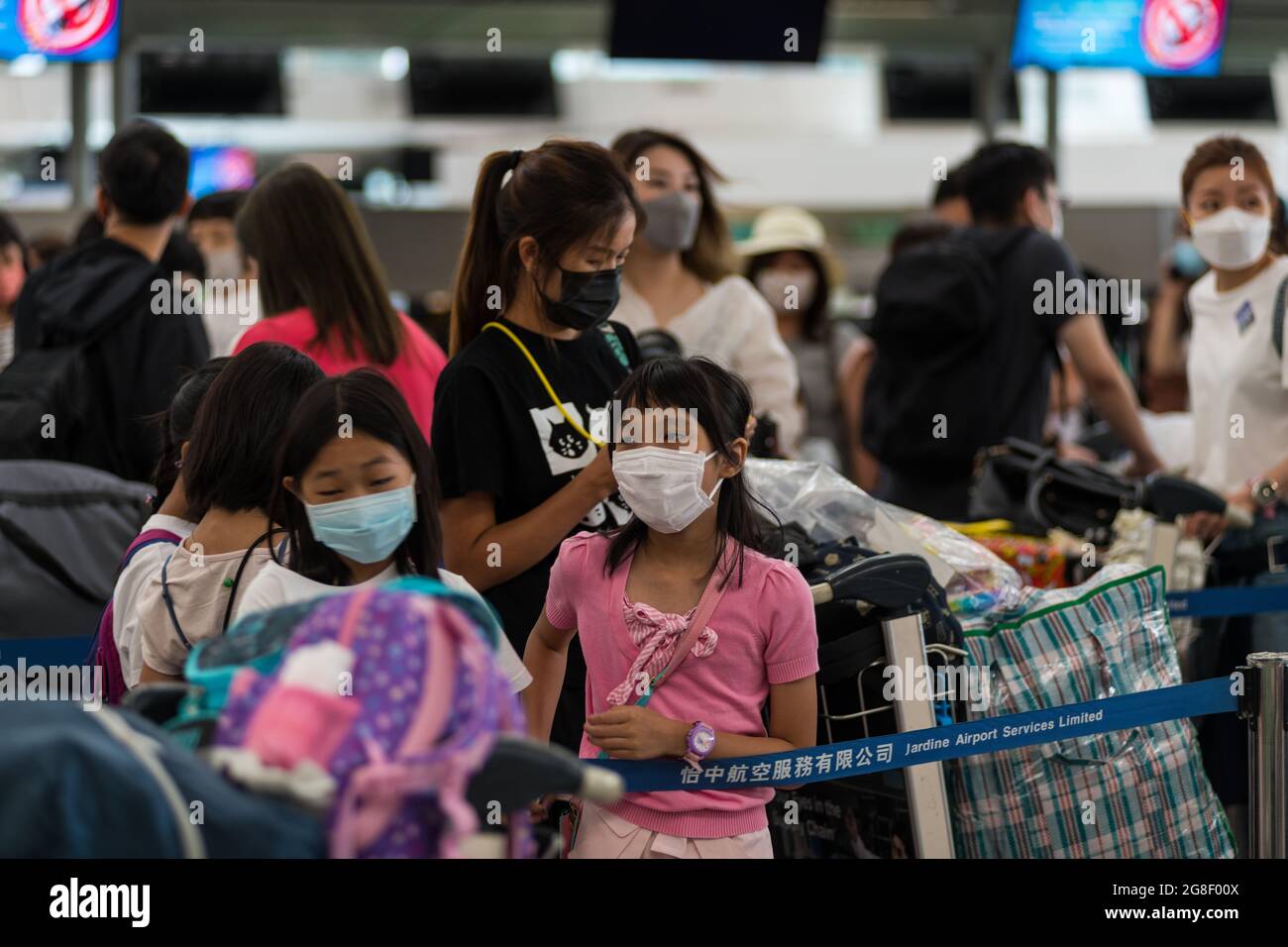 Hong Kong, China, 17 Jul 2021, Entire families could be spotted leaving for the United Kingdom on Saturday 17 July, many with children. Stock Photo