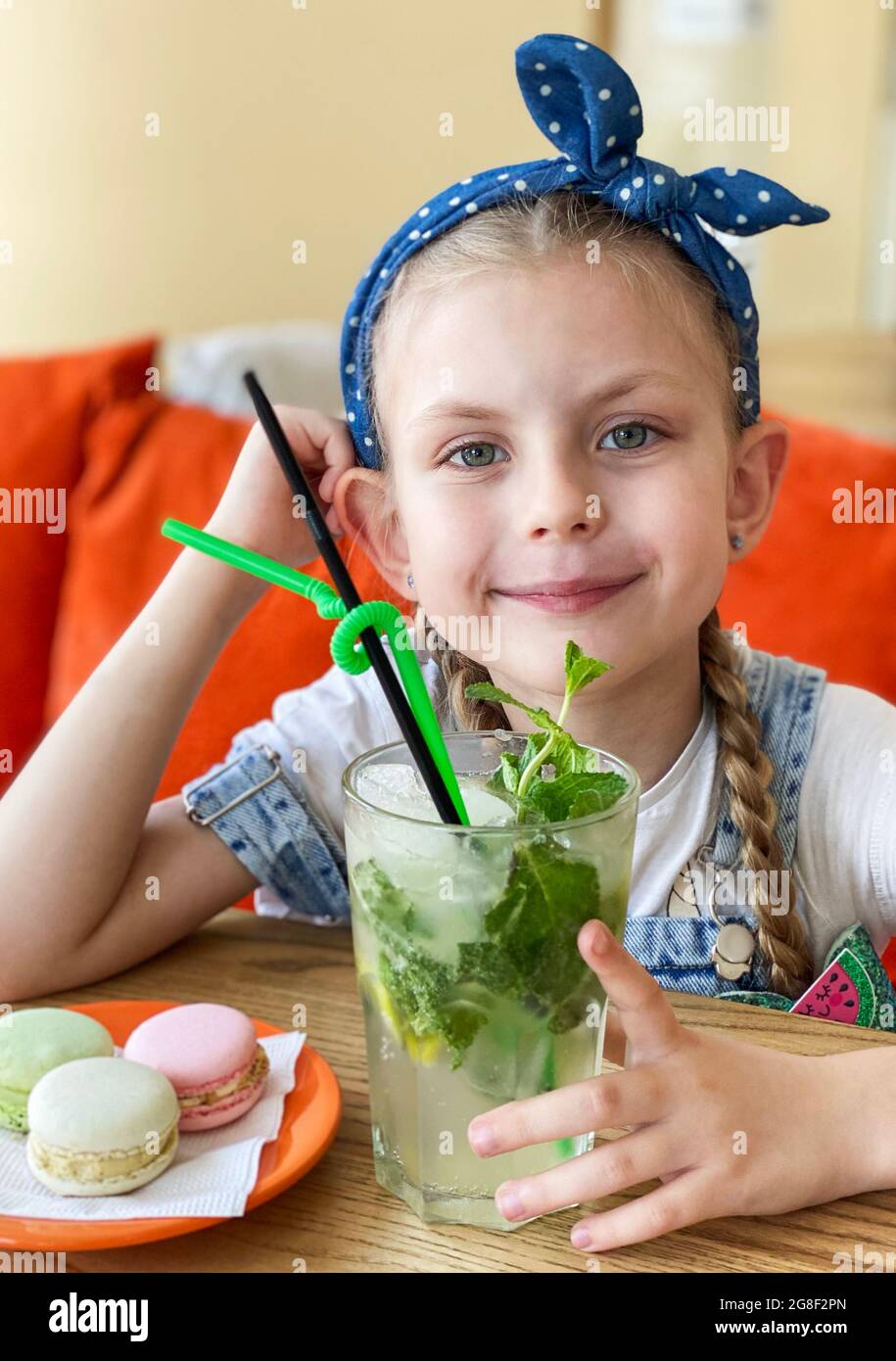 Little Girl Drinking Non alcoholic Mojito In A Cafe Stock Photo Alamy little-girl-drinking-non-alcoholic-mojito-in-a-cafe-stock-photo-alamy