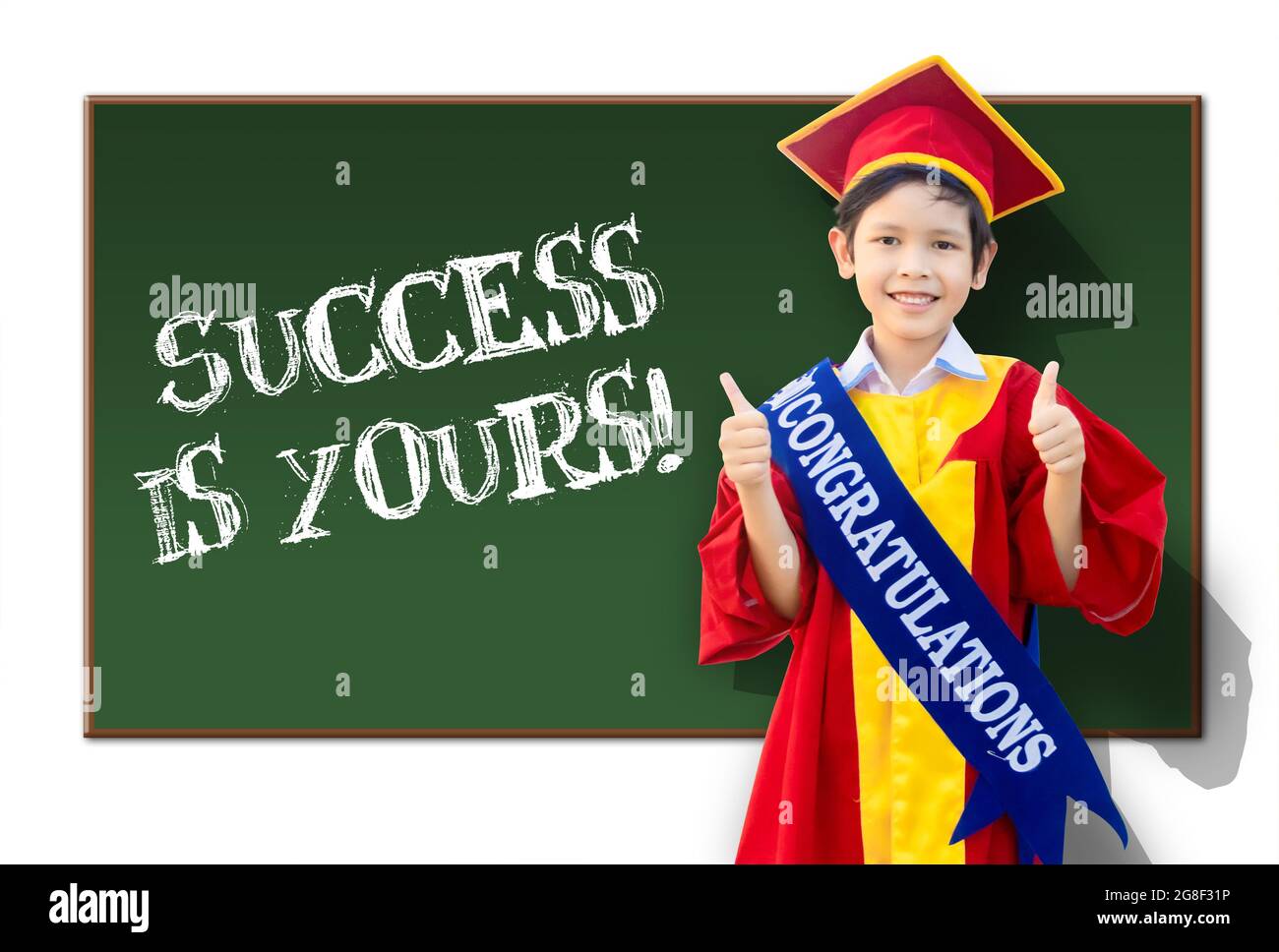 Little graduate success and boy in a red gown Stock Photo