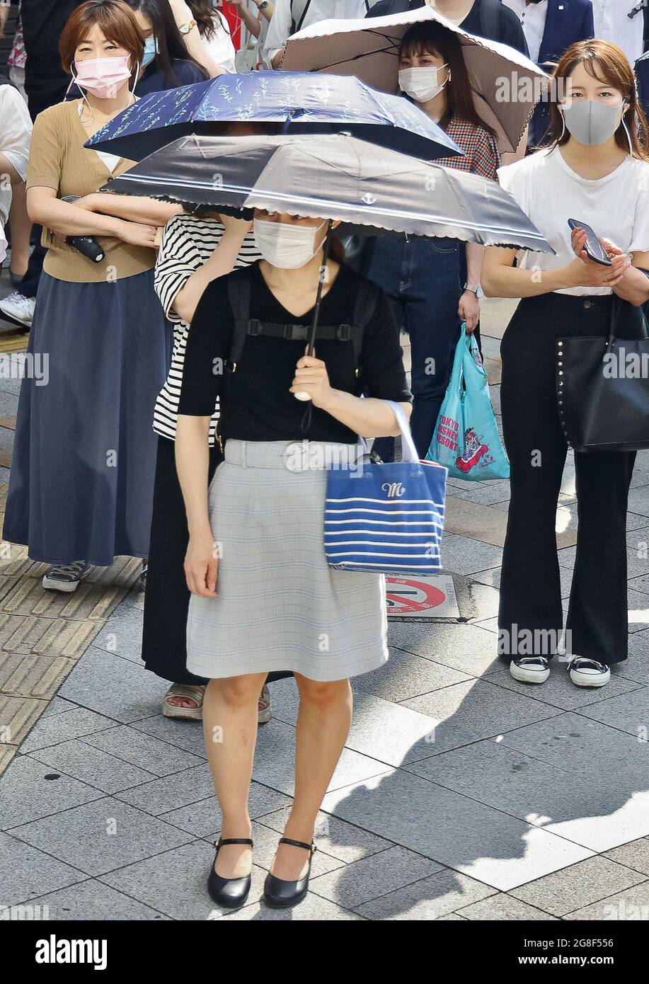 Tokyo Japan July 21 People Walk In Central Tokyo Tokyo Was To Host The Summer Olympic Games On July 24 August 9 The Games Were Postponed For A Year