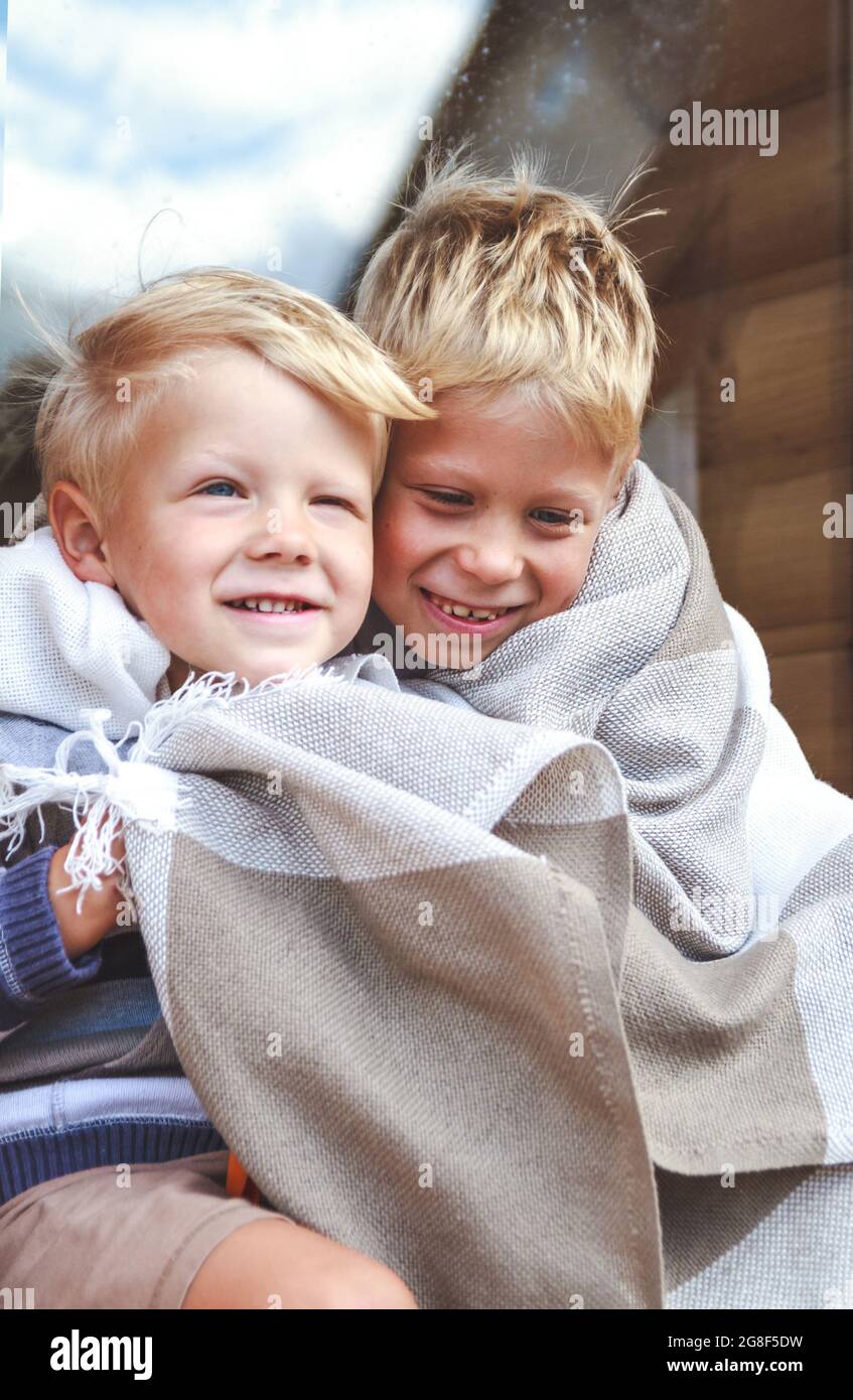 Two brothers hug hi-res stock photography and images - Alamy