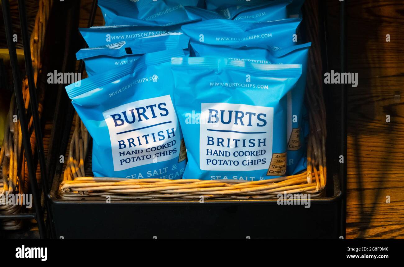 Bags of Burts British hand cooked potato chips Stock Photo Alamy