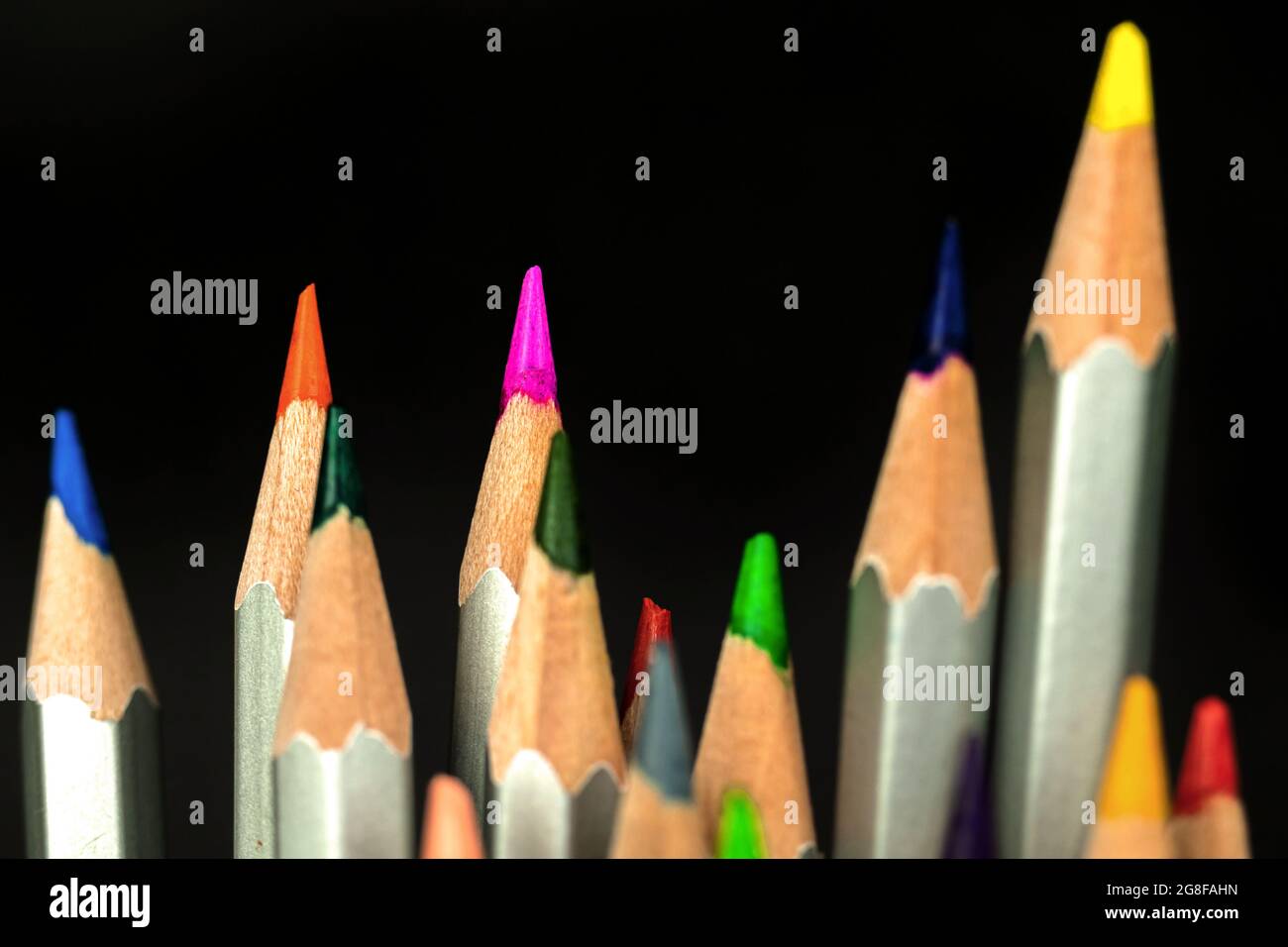 Close-up to school pencils tips on black bacground Stock Photo