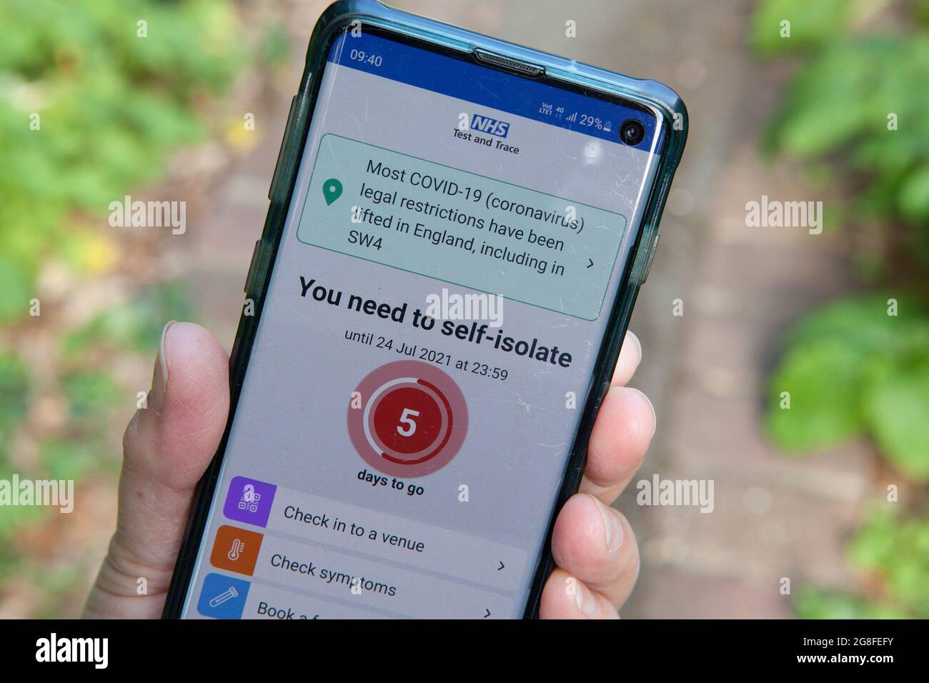 London, UK, 20 July 2021: The NHS Covid app on a smart phone shows a count-down to the end of self-isolation triggered by contact with a person infected with coronavirus. Business Minister Paul Scully had said that self-isolation was optional if pinged by the app if businesses were facing staff shortages, but Downing Street has said that employers should not encourage workers to ignore the app's warnings. Contact from NHS Track and Trace is a legal requirement but notifications from the app are not compulsory. Anna Watson/Alamy Live News Stock Photo