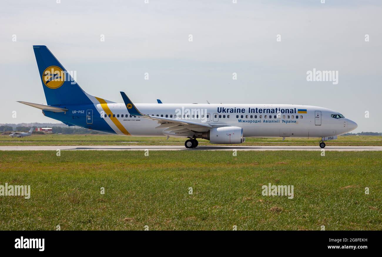 Ukraine, Odessa - July 16, 2021: Passenger aircraft UR-PSZ UKRAINE INTERNATIONAL AIRLINES BOEING 737-800 plane at Odesa airport. Travel and flights. Stock Photo