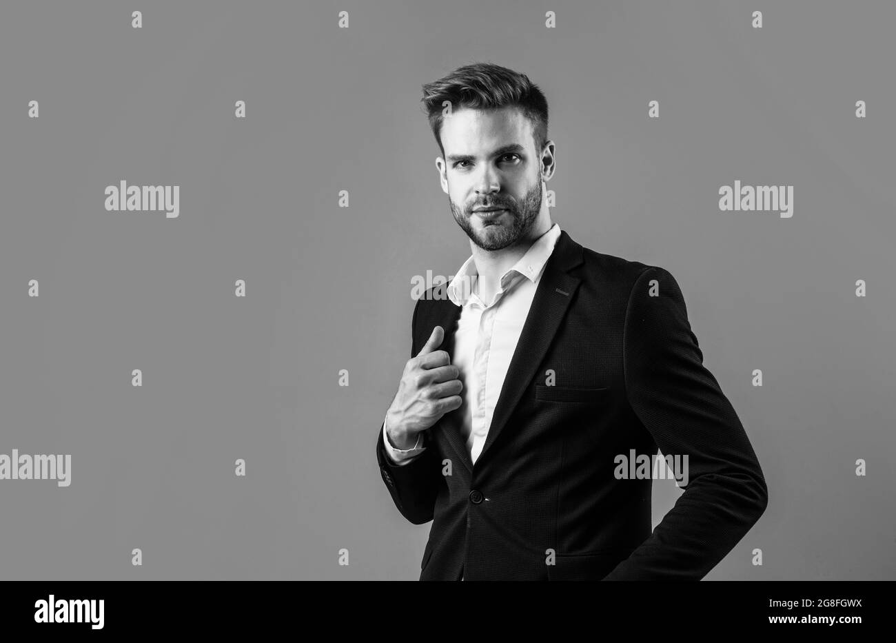 In his own style. well groomed hairstyle. male beauty and fashion look.  formal office costume for bearded guy. unshaven handsome man with bristle  Stock Photo - Alamy