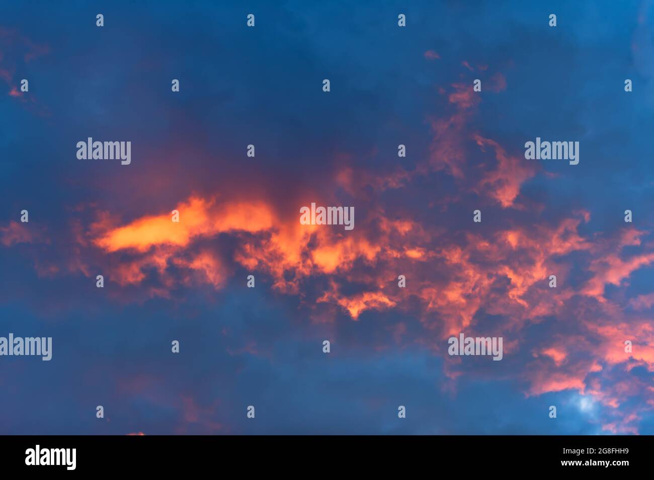 Strange sky with clouds looking fire Stock Photo