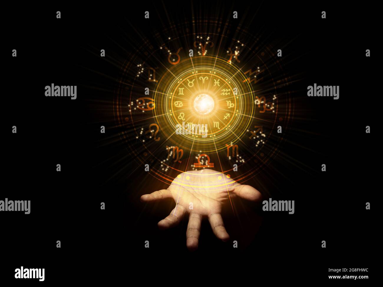 Zodiac signs inside of horoscope circle. Astrology in the sky with many stars and moons astrology and horoscopes concept. Stock Photo