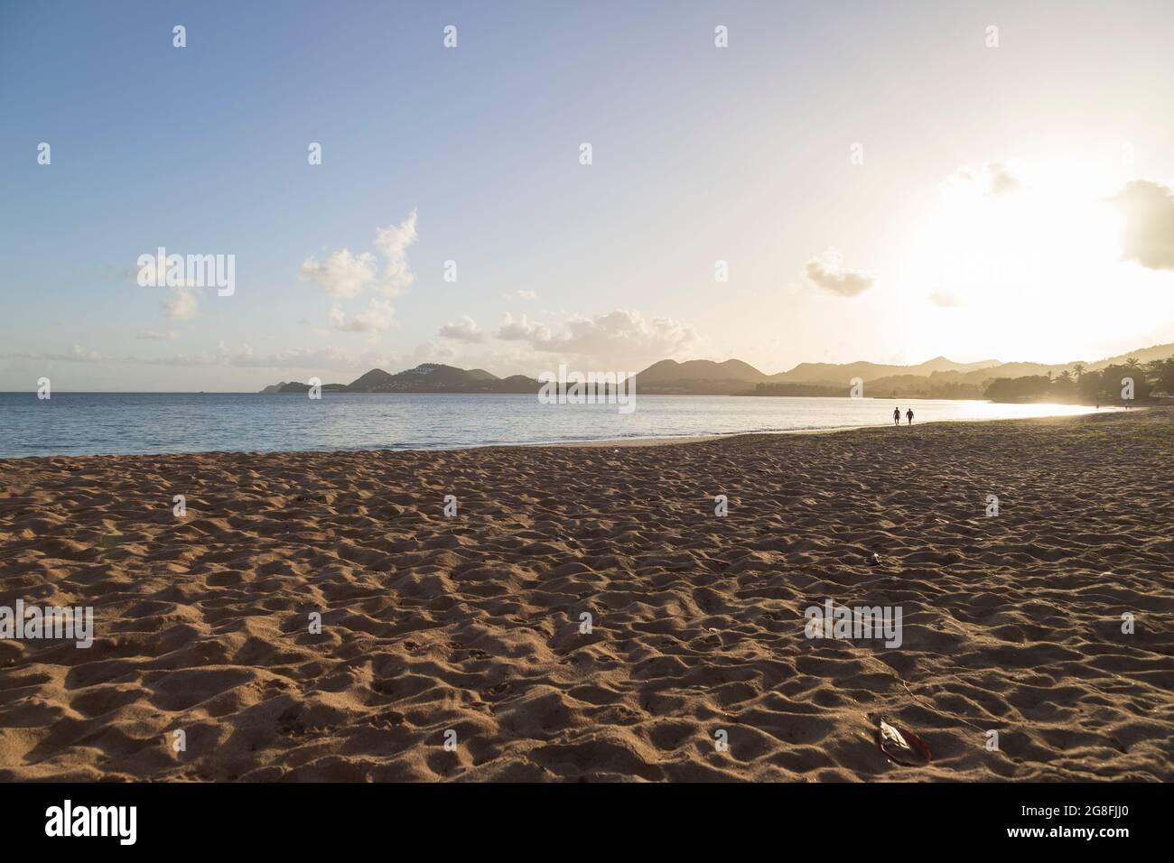 Tropical beach scenery at sunrise Stock Photo