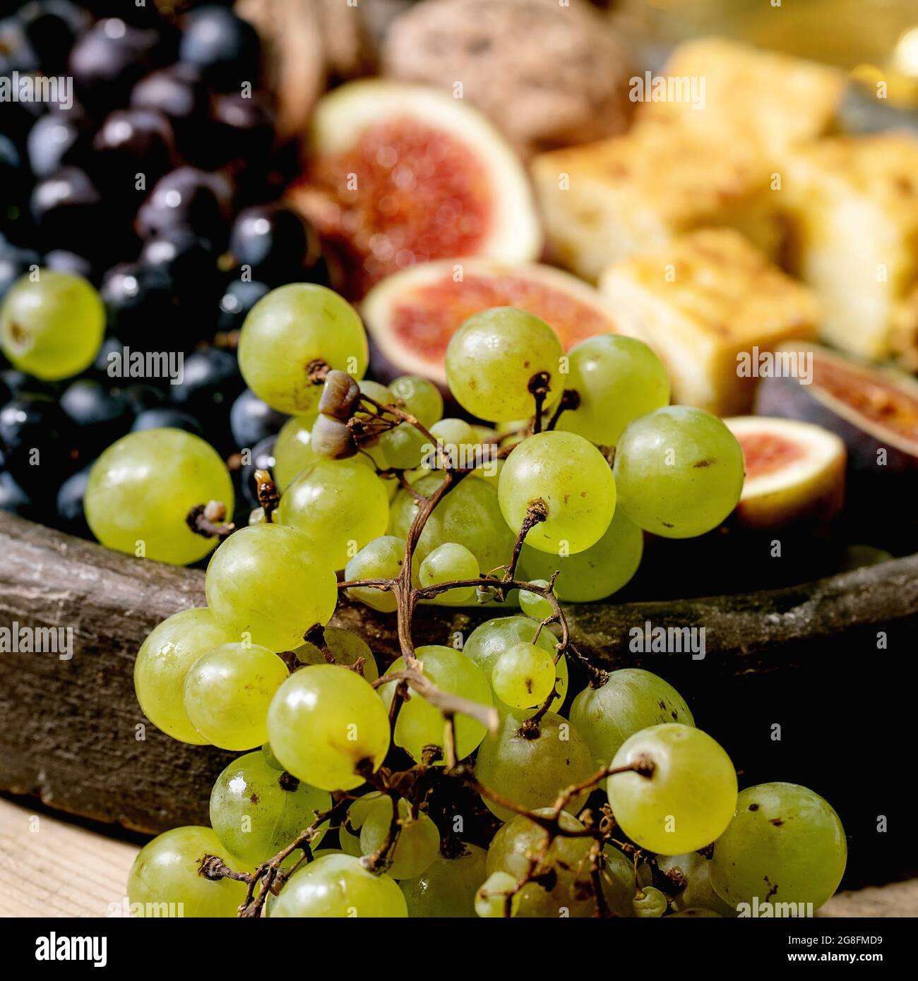 Wine appetizers with grapes Stock Photo