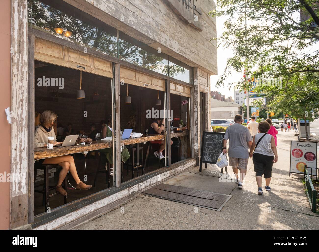 Open air dining at a coffee shop in the Sunnyside neighborhood of