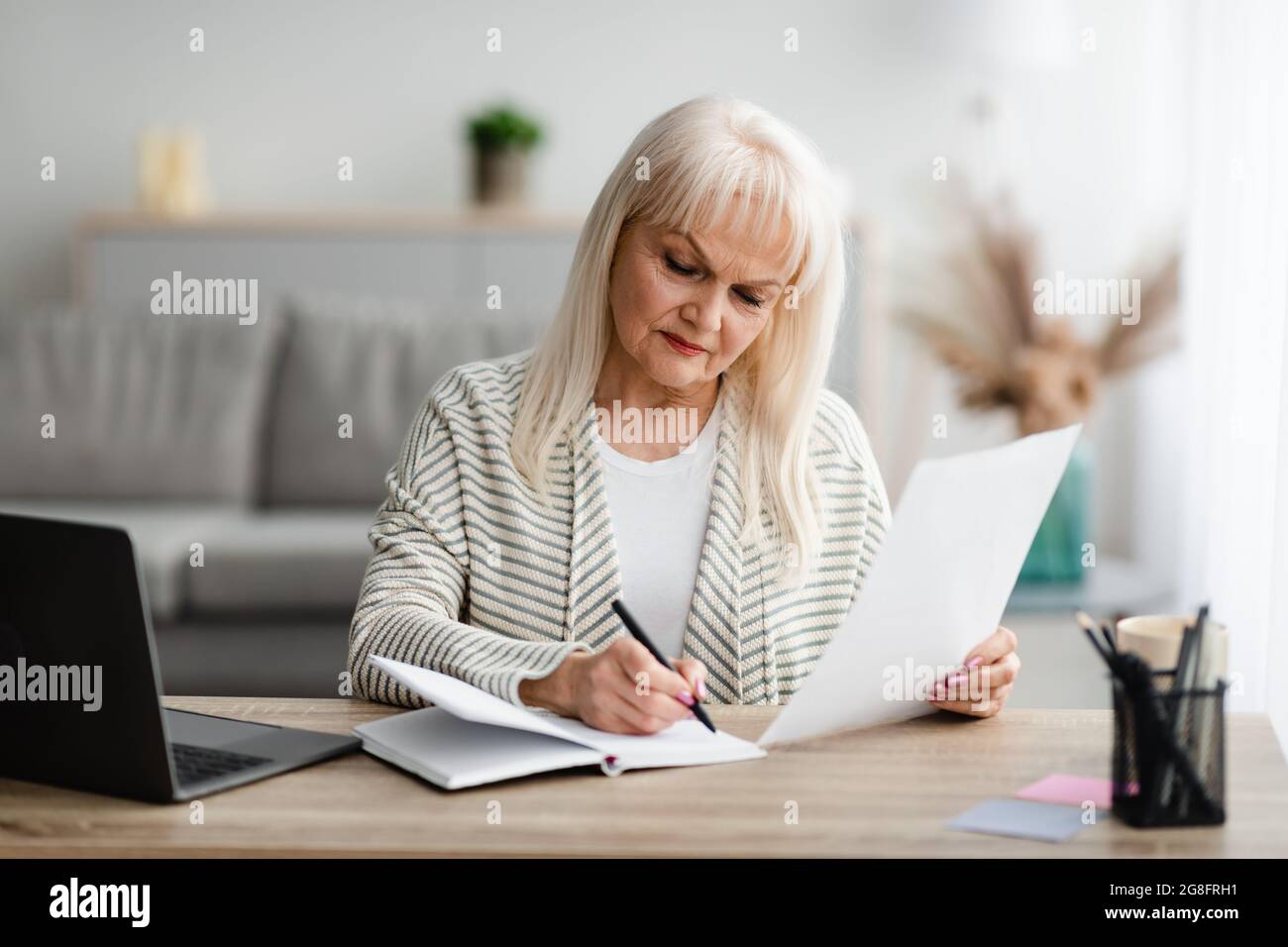Old lady writing letter hi-res stock photography and images - Alamy