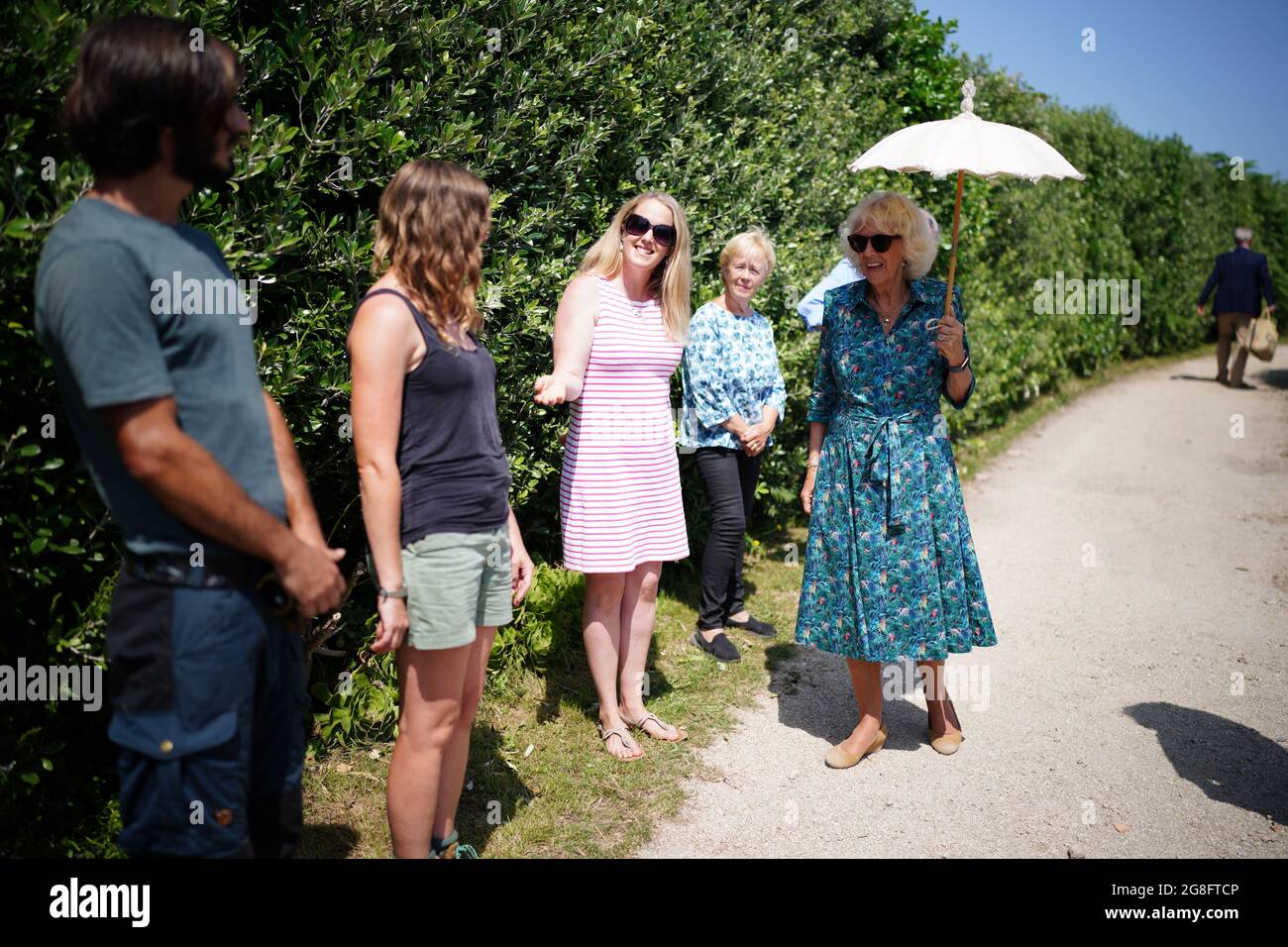 The Duchess of Cornwall meets Issy Taylor, who introduces her to staff