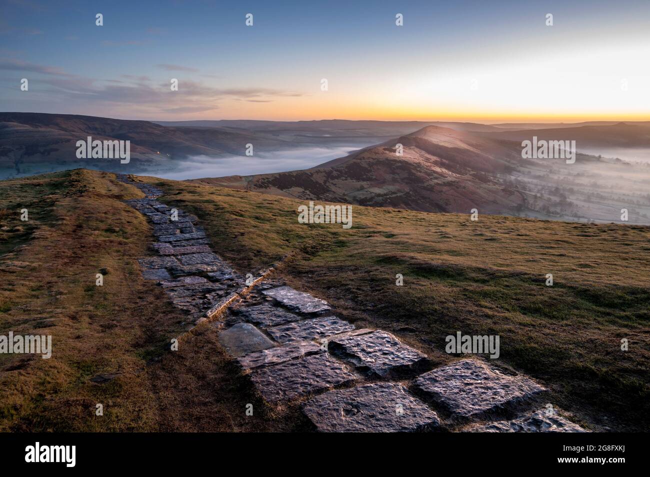 The path at Mam Tor leading to Losehill at sunrise, Peak District, Derbyshire, England, United Kingdom, Europe Stock Photo