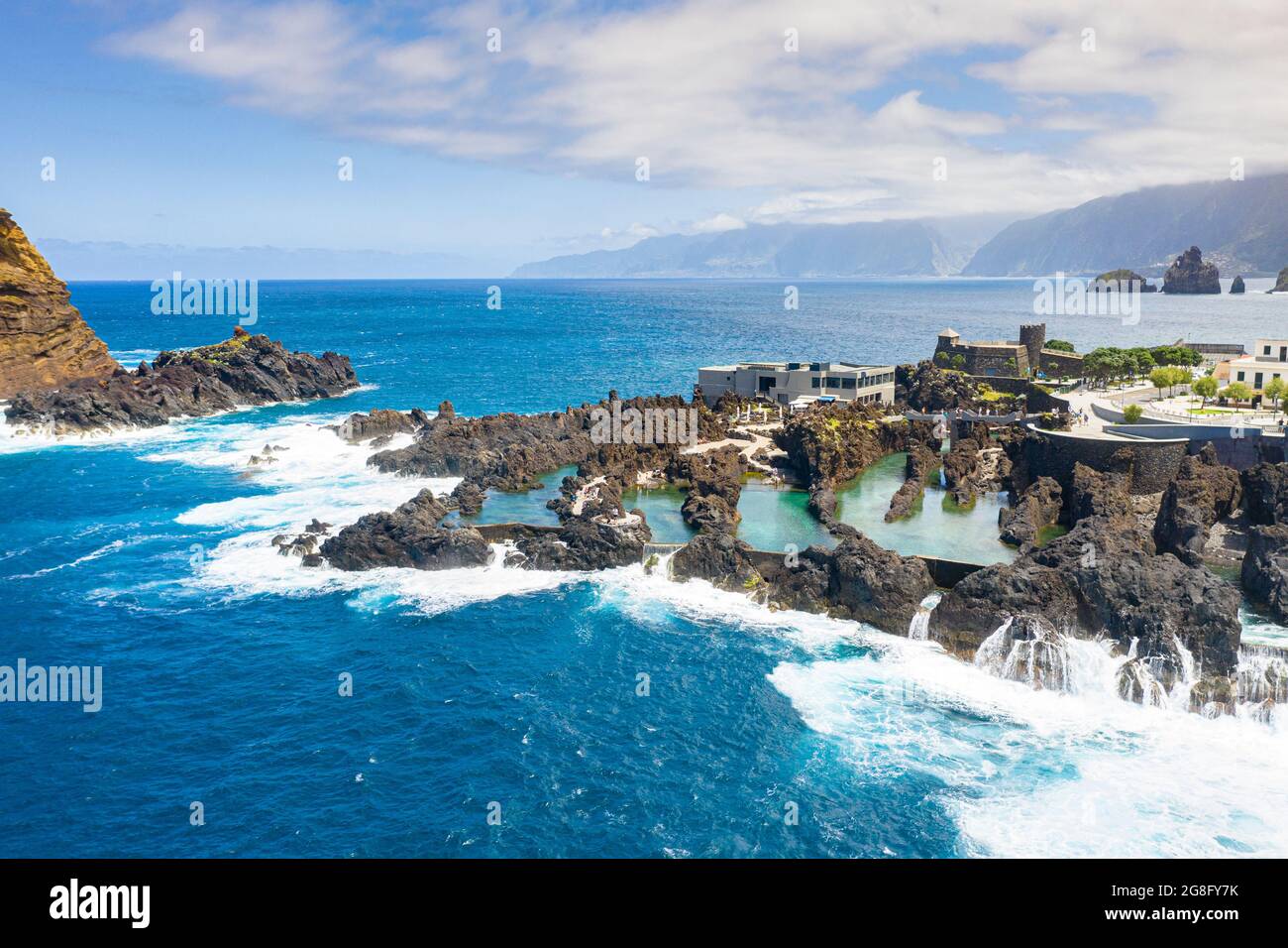 Natural pools formed by volcanic lava filled with crystalclear sea water, Porto Moniz, Madeira