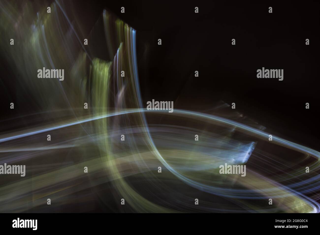 Abstract illustration with light from multi-colored curved lines on a ...