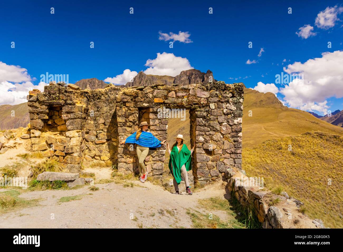 Woman exploring Inti Punku (Sun Gate), Cusco, Peru, South America Stock Photo