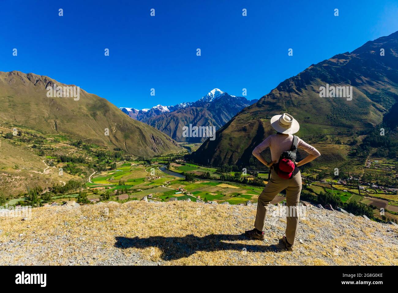 Woman exploring Inti Punku (Sun Gate), Cusco, Peru, South America Stock Photo