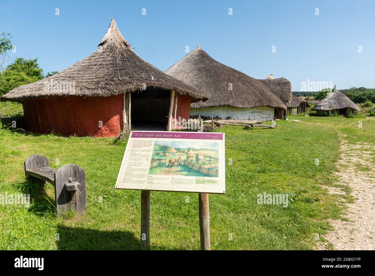 Iron age roundhouses reconstructed at Butser Ancient Farm archeological open-air museum in Hampshire, England, UK Stock Photo