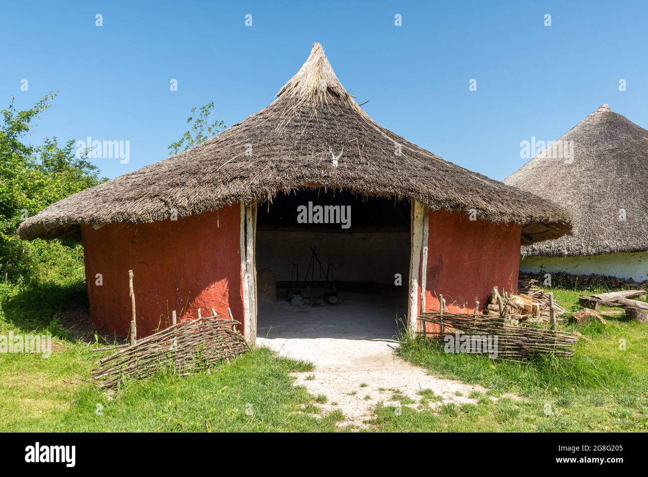 Iron age roundhouse reconstructed at Butser Ancient Farm archeological