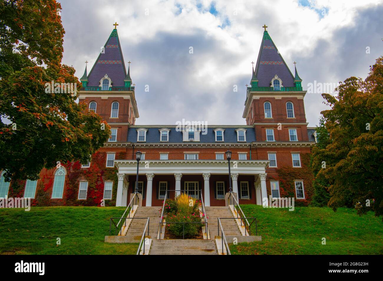 Fenwick Hall in College of the Holy Cross with fall foliage in city of Worcester, Massachusetts MA, USA. Stock Photo