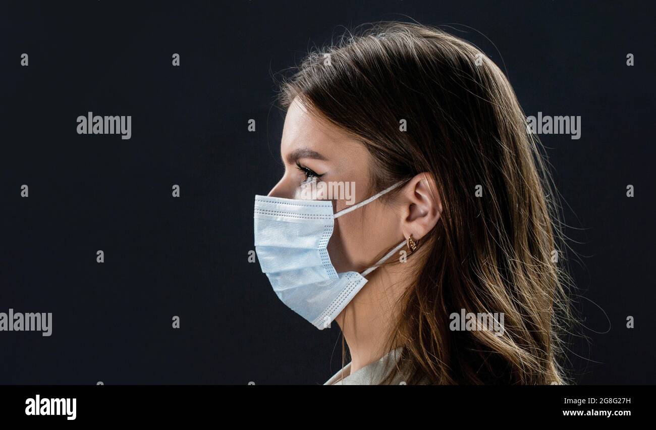 Face of people in protective masks from coronavirus. Wearing a protective face mask, pandemic. Lifestyle COVID-19 Stock Photo