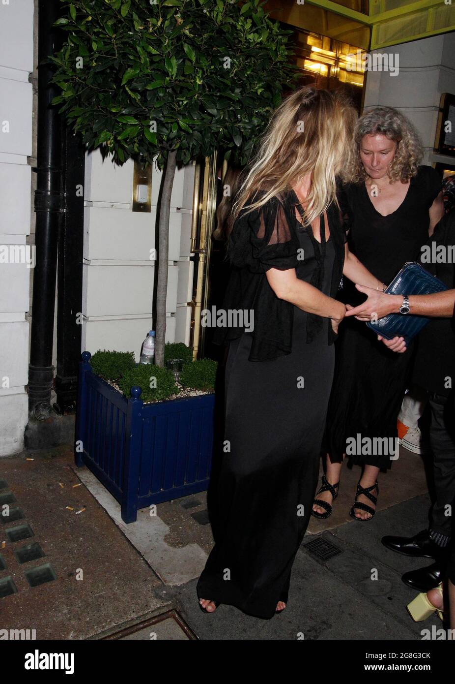 Kate Moss Amelia Windsor Sadie frost and other went to Isabel’s to celebrate a new book which is coming out soon. They all had a drink or two but Kate does not drink any more. Sadie does and maybe the others. They all went home early around 10pm. Amelia was having a drink with Sadie . Amelia did not drink but Sadie did and then got in a taxi to go home 19/7/2021 blitz pictures Stock Photo