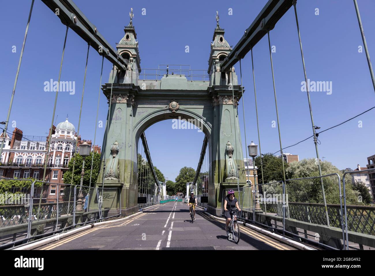 Hammersmith Bridge, the first iron suspension bridge to span the Thames, reopens to cyclists and pedestrians, West London, England, United Kingdom Stock Photo