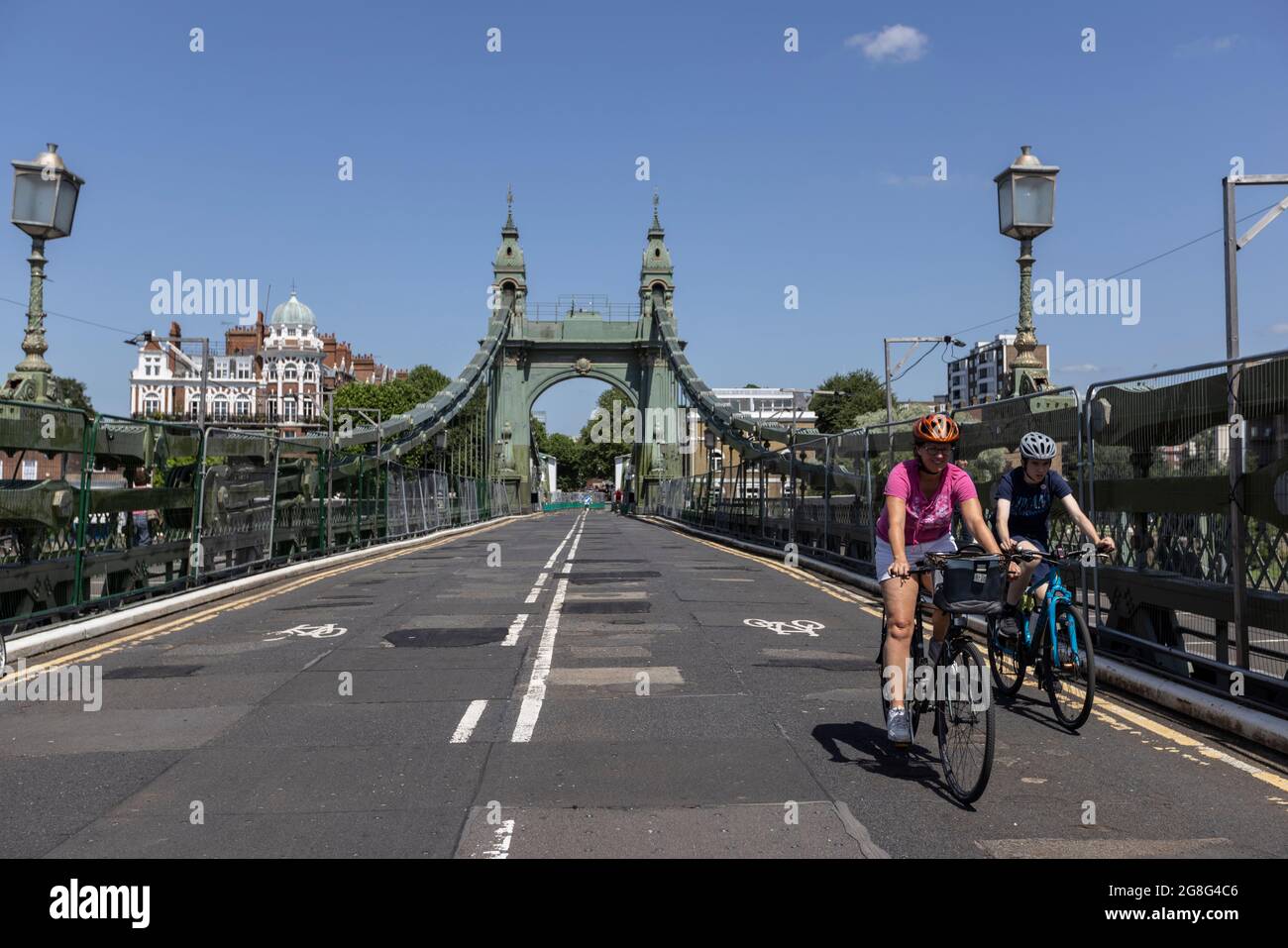 Hammersmith Bridge, the first iron suspension bridge to span the Thames, reopens to cyclists and pedestrians, West London, England, United Kingdom Stock Photo