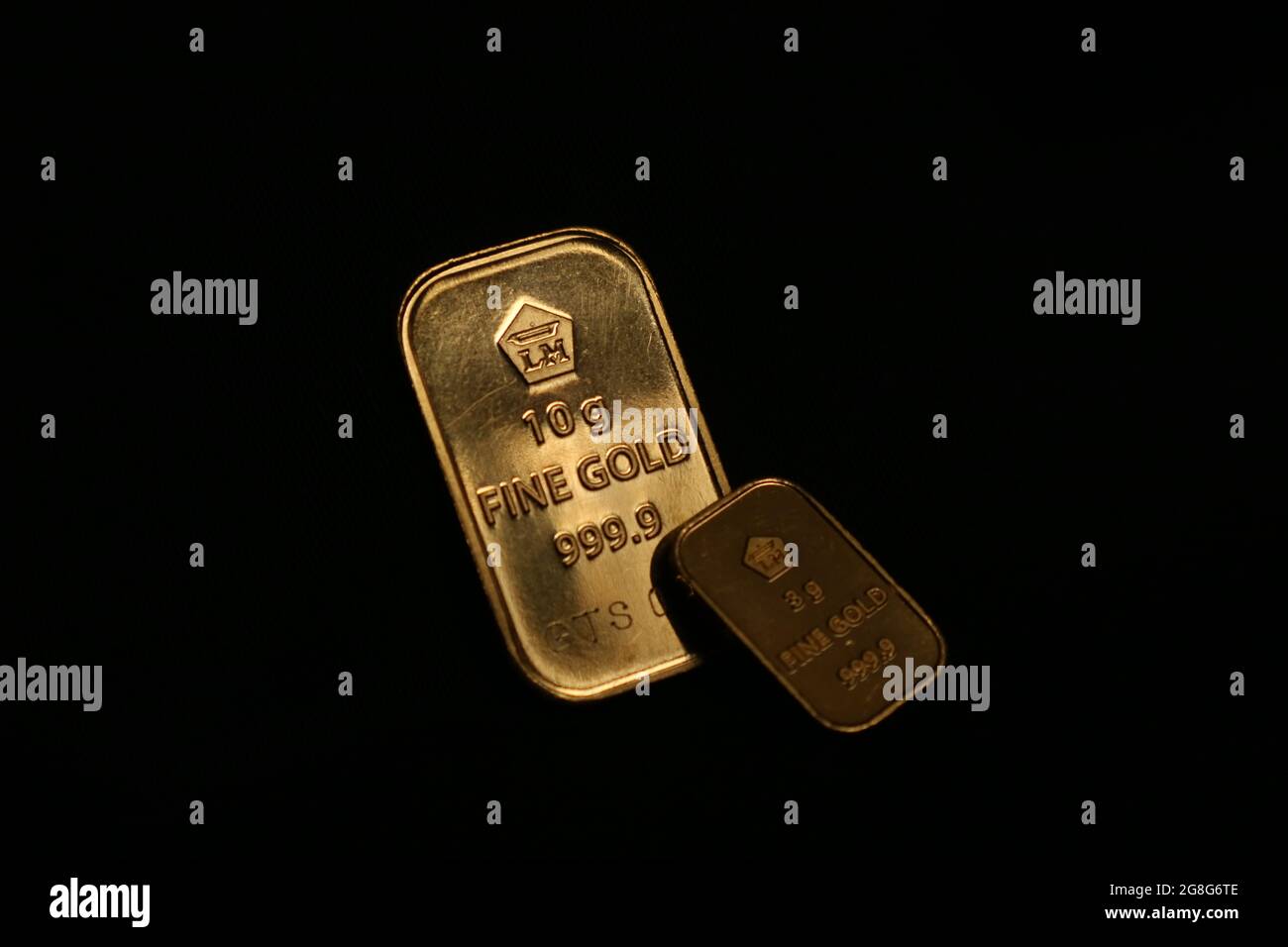 Fine Gold Bar Goldbar On Black Background Produced By Pt Aneka Tambang Antam Indonesia Stock Photo Alamy