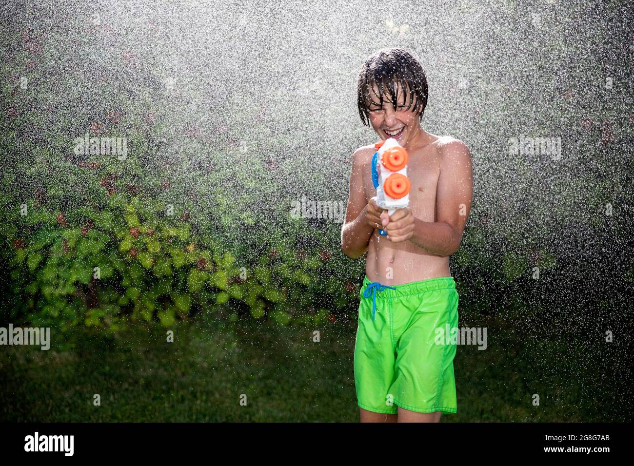 Wearing swimming trunks hi-res stock 
