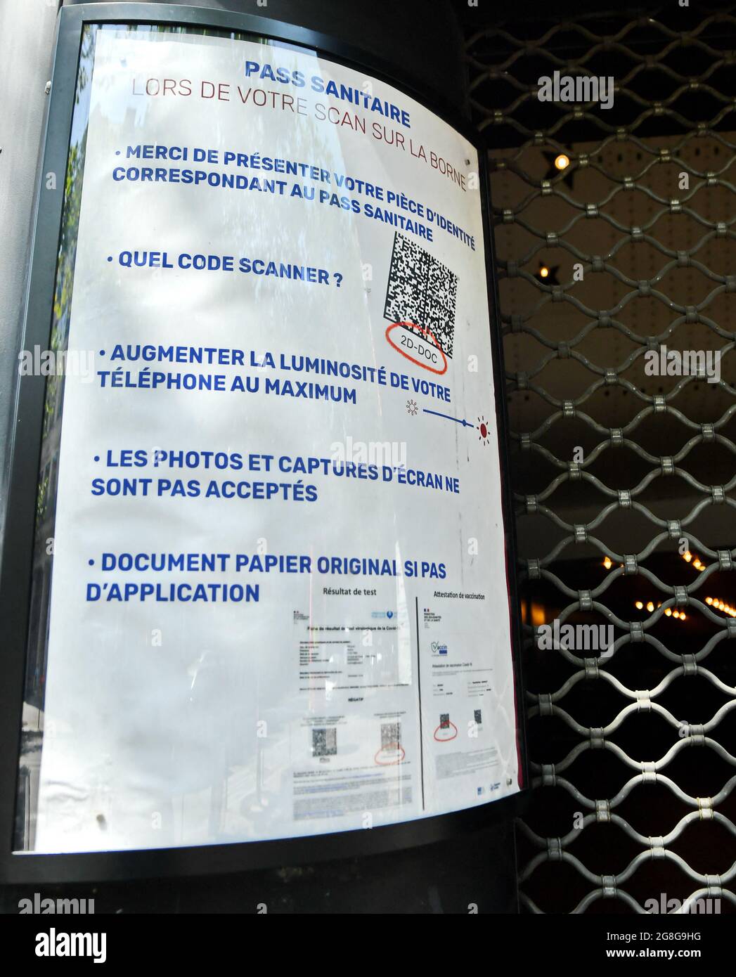 Affiche of mandatory Sanitary Pass put on wall the OlympiaHall in Paris