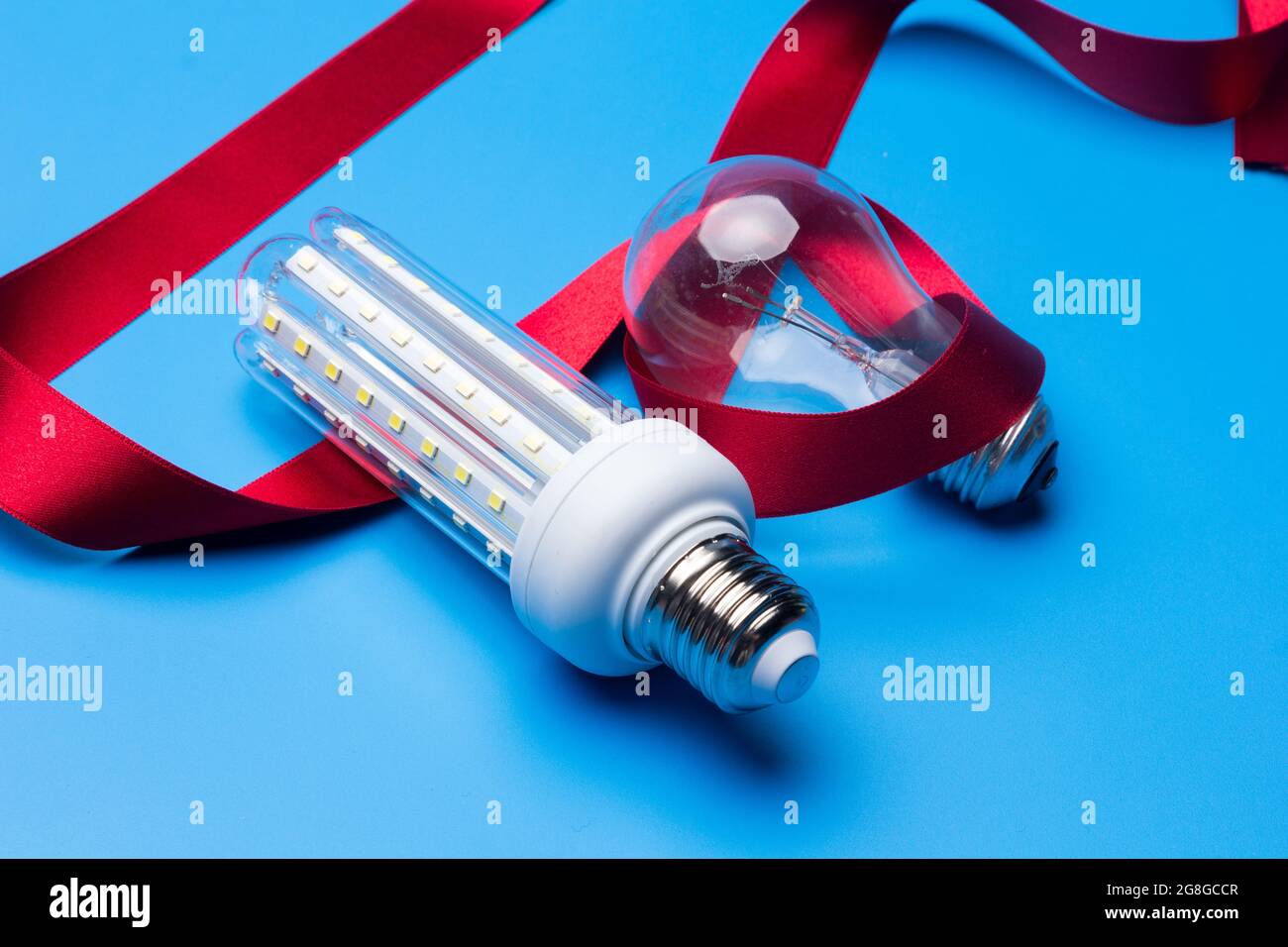 Energysaving light bulb and classic incandescent bulb with high energy