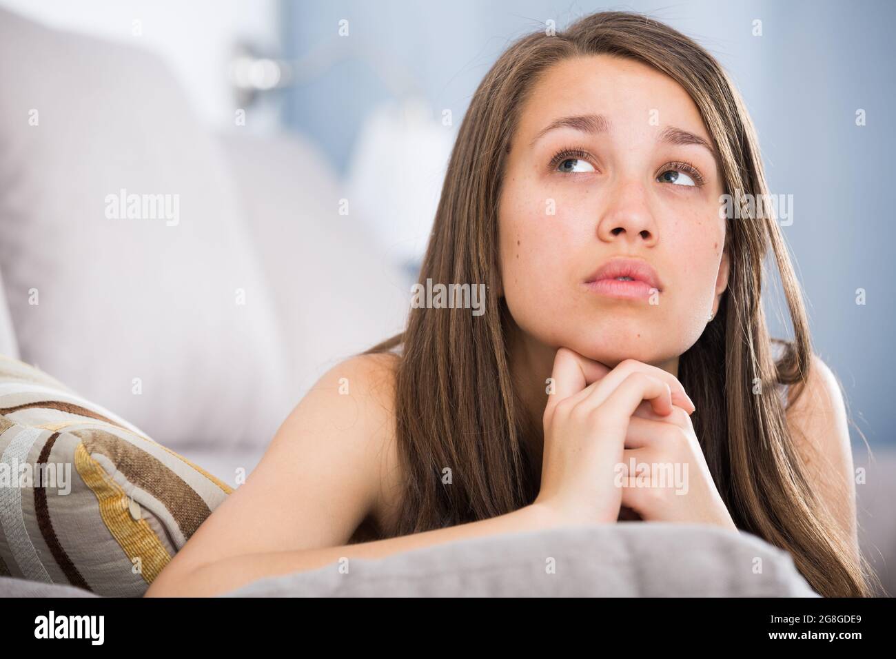 Teenage girl is feeling sad and lonely Stock Photo
