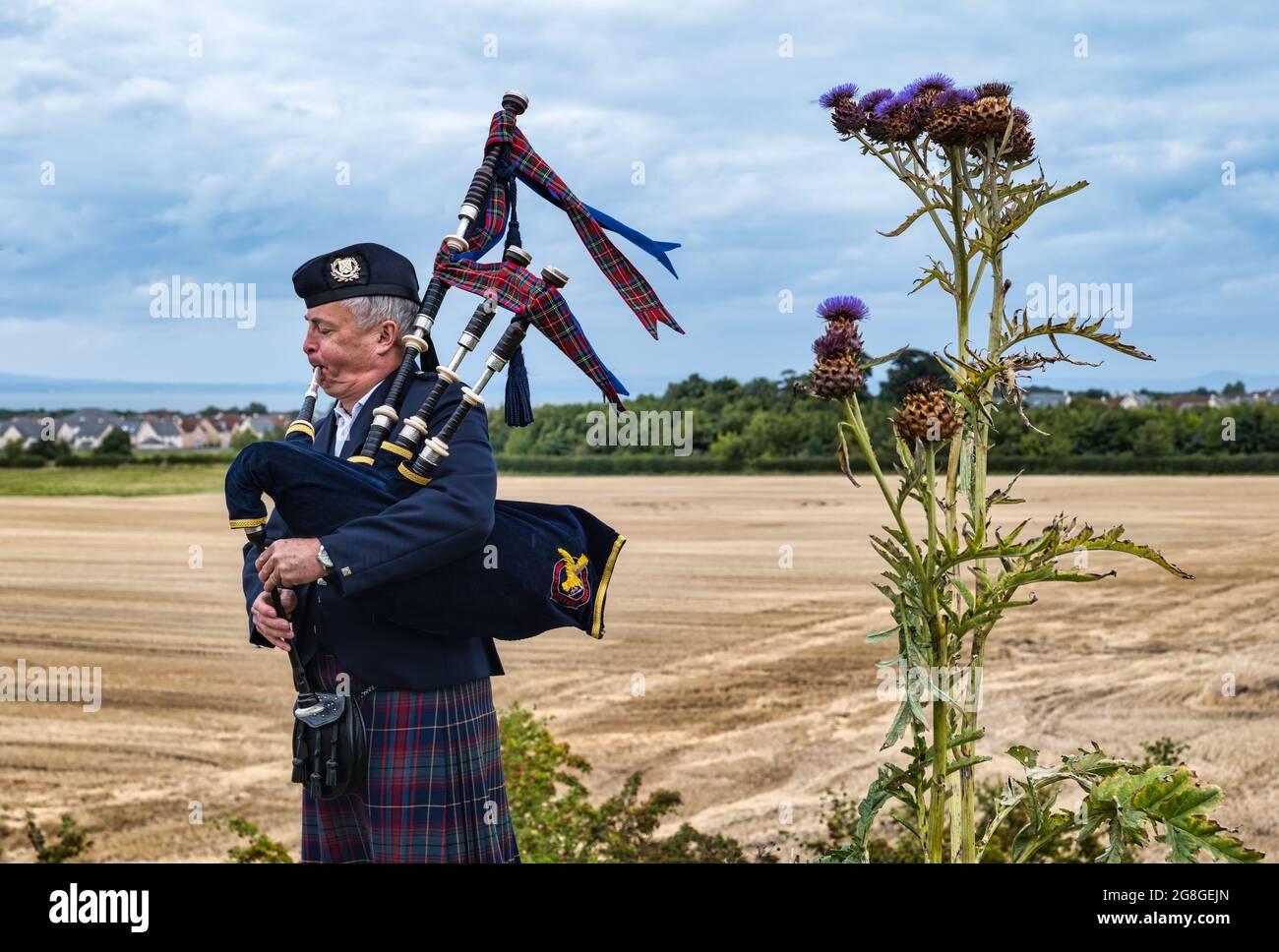 Piper playing bagpipes at Battle of Pinkie Cleugh commemoration ceremony, East Lothian, Scotland, UK Stock Photo