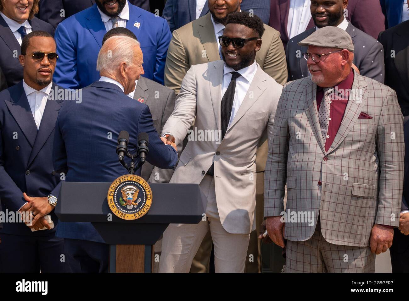 United States President Joe Biden shakes hands with Tampa Bay Buccaneers  wide receiver Chris Godwin (14) prior to making remarks welcoming the 2021  the Super Bowl LV (Super Bowl 55) Champion Tampa