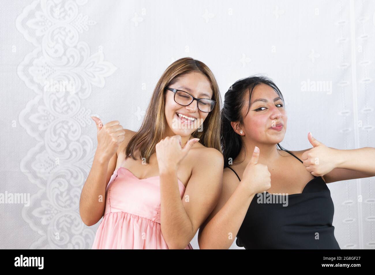 Thumbs up beautiful young woman hi-res stock photography and images - Alamy