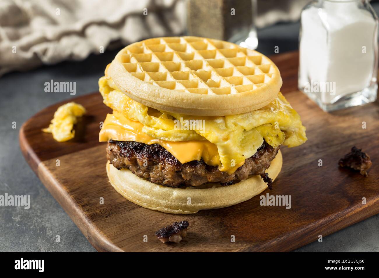 Homemade Waffle Breakfast Egg Sandwich with Cheese and Sausage Stock