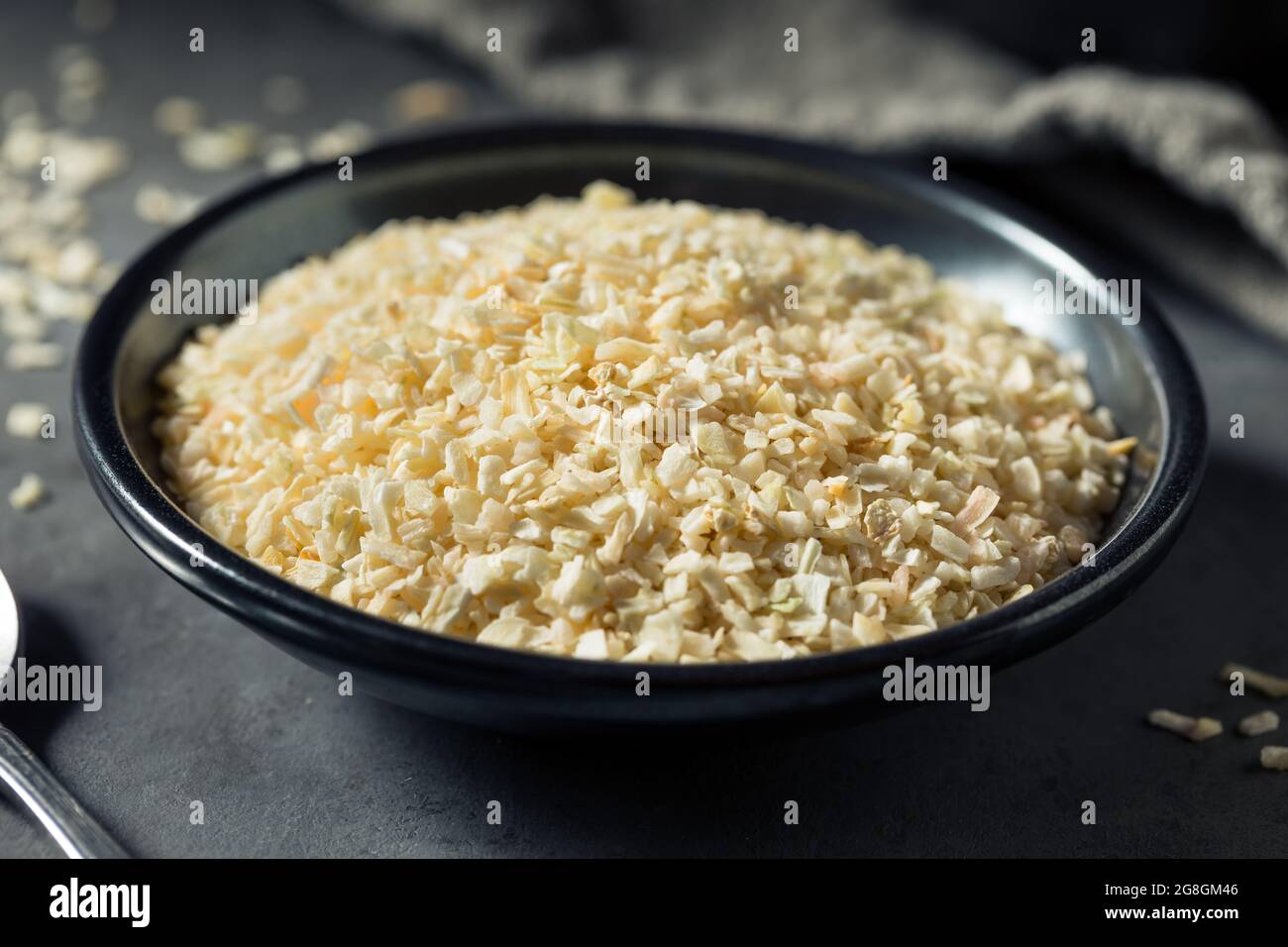 Healthy Organic Dry Minced Onion Spice in a Bowl Stock Photo Alamy