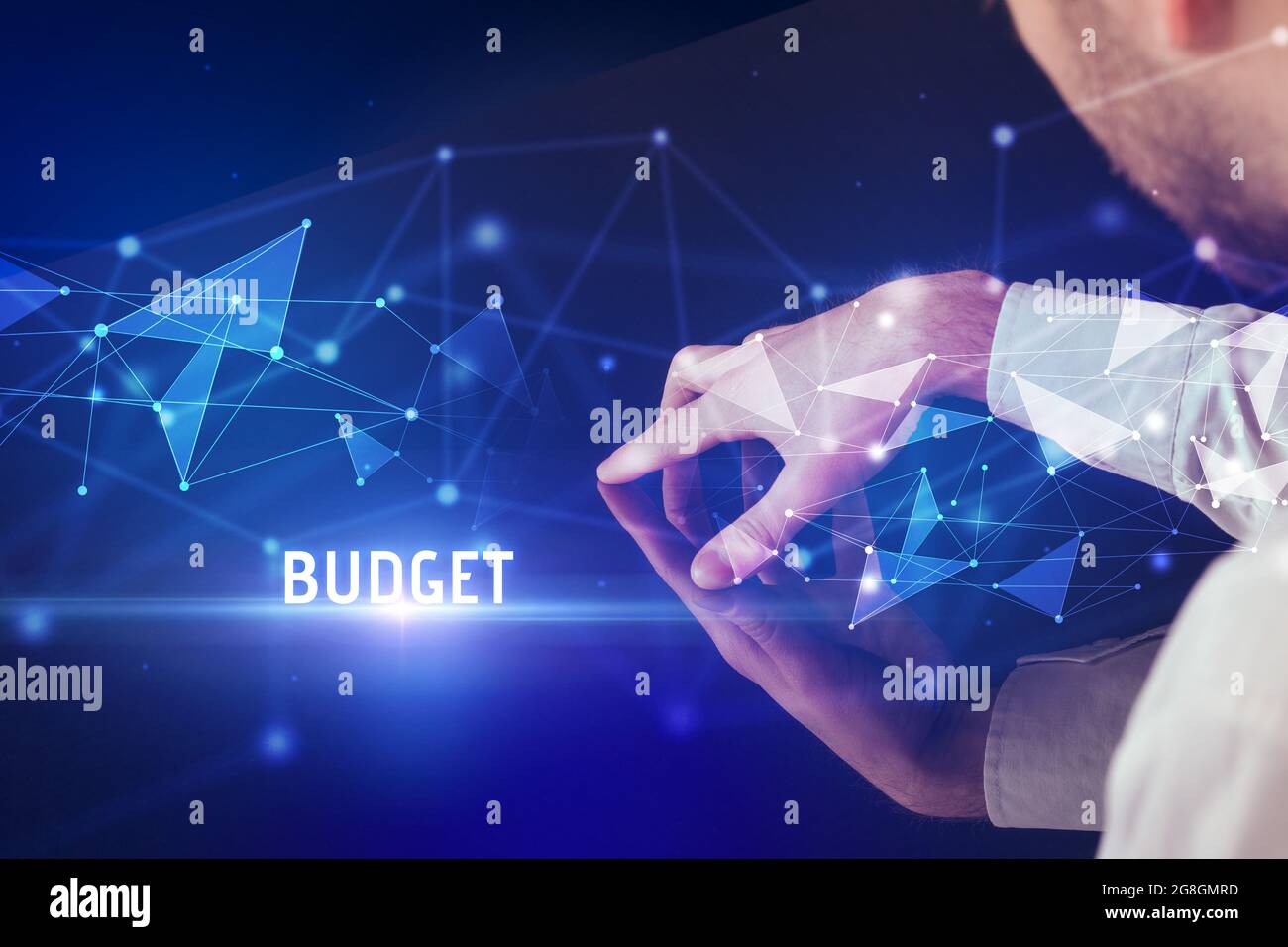 Businessman touching huge screen concept Stock Photo