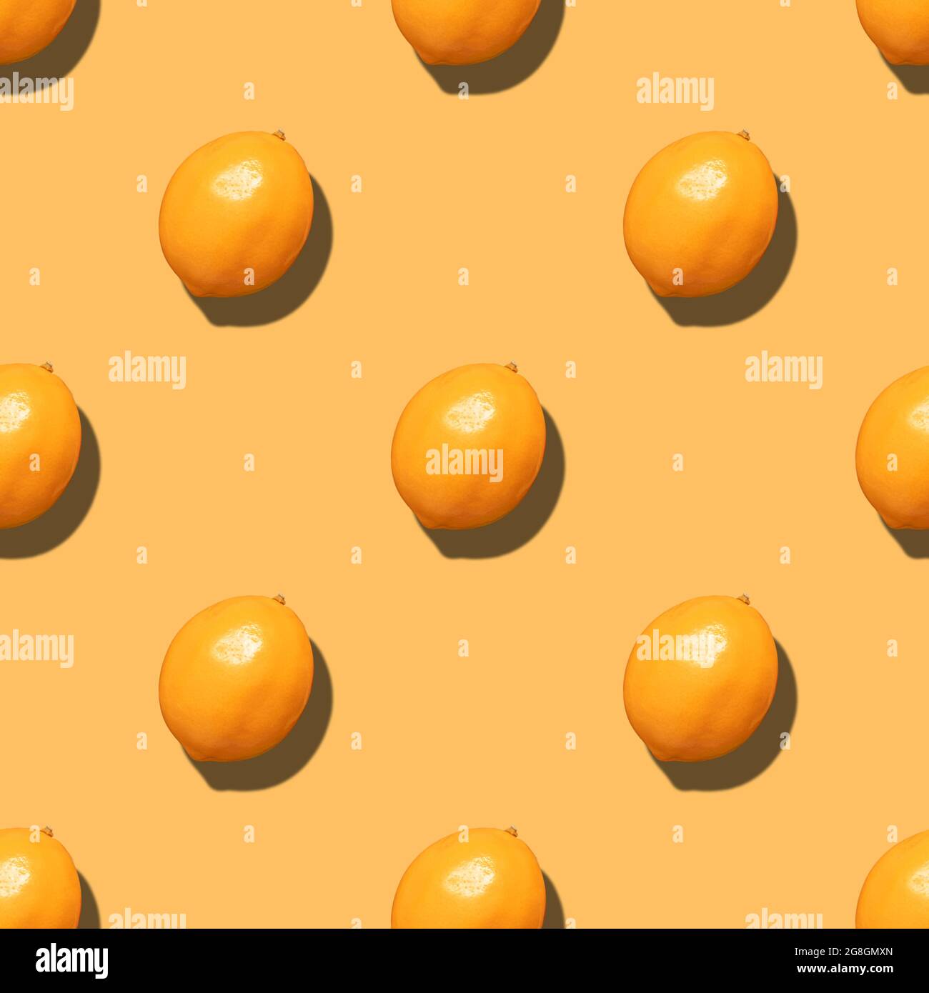 Orange seamless pattern. Fruit pattern for the design. Summer background. Minimal fruit concept. Top view, flat lay. Stock Photo