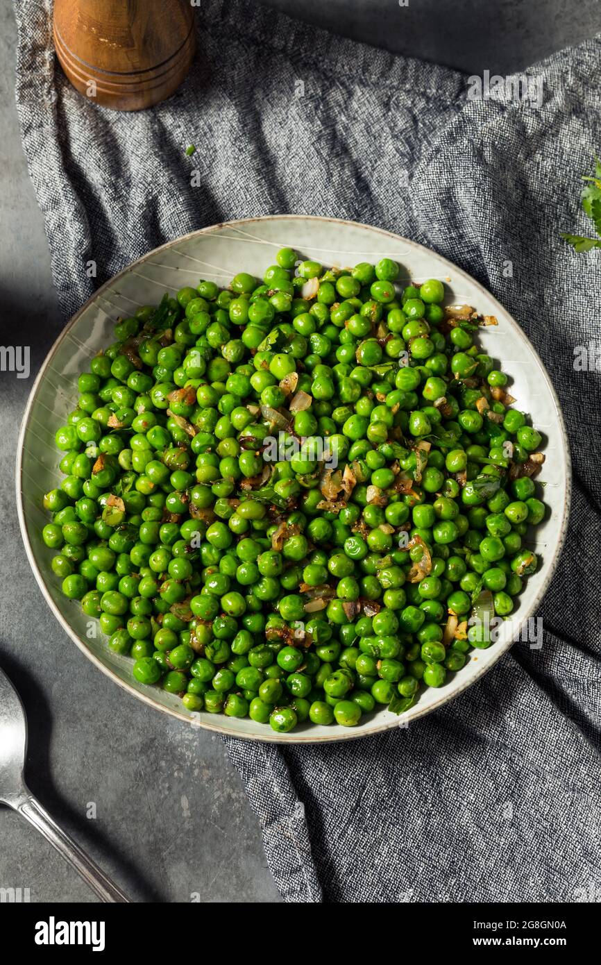 Healthy Homemade Sauteed Green Peas with Salt and Pepper Stock Photo