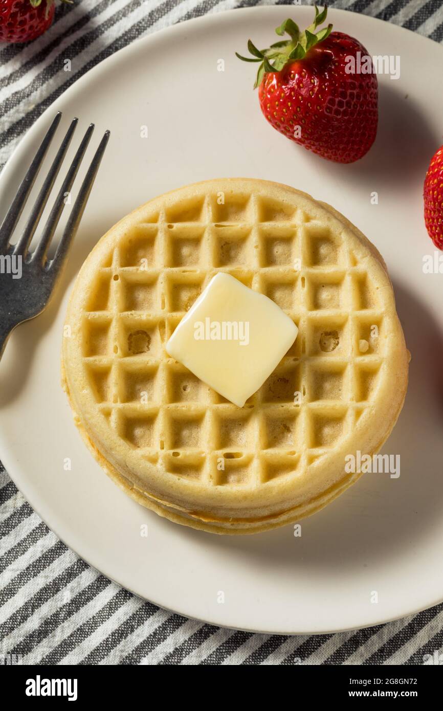 Healthy Cooked Frozen Waffles for Breakfast with Butter Stock Photo Alamy