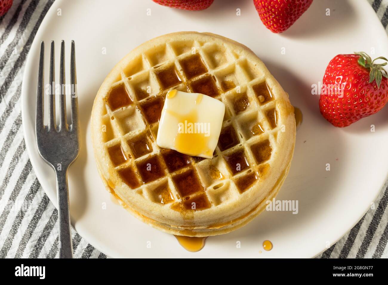 Healthy Cooked Frozen Waffles for Breakfast with Butter Stock Photo Alamy